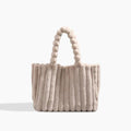 Sac à la ligne arrondie