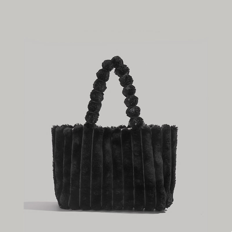 Sac à la ligne arrondie