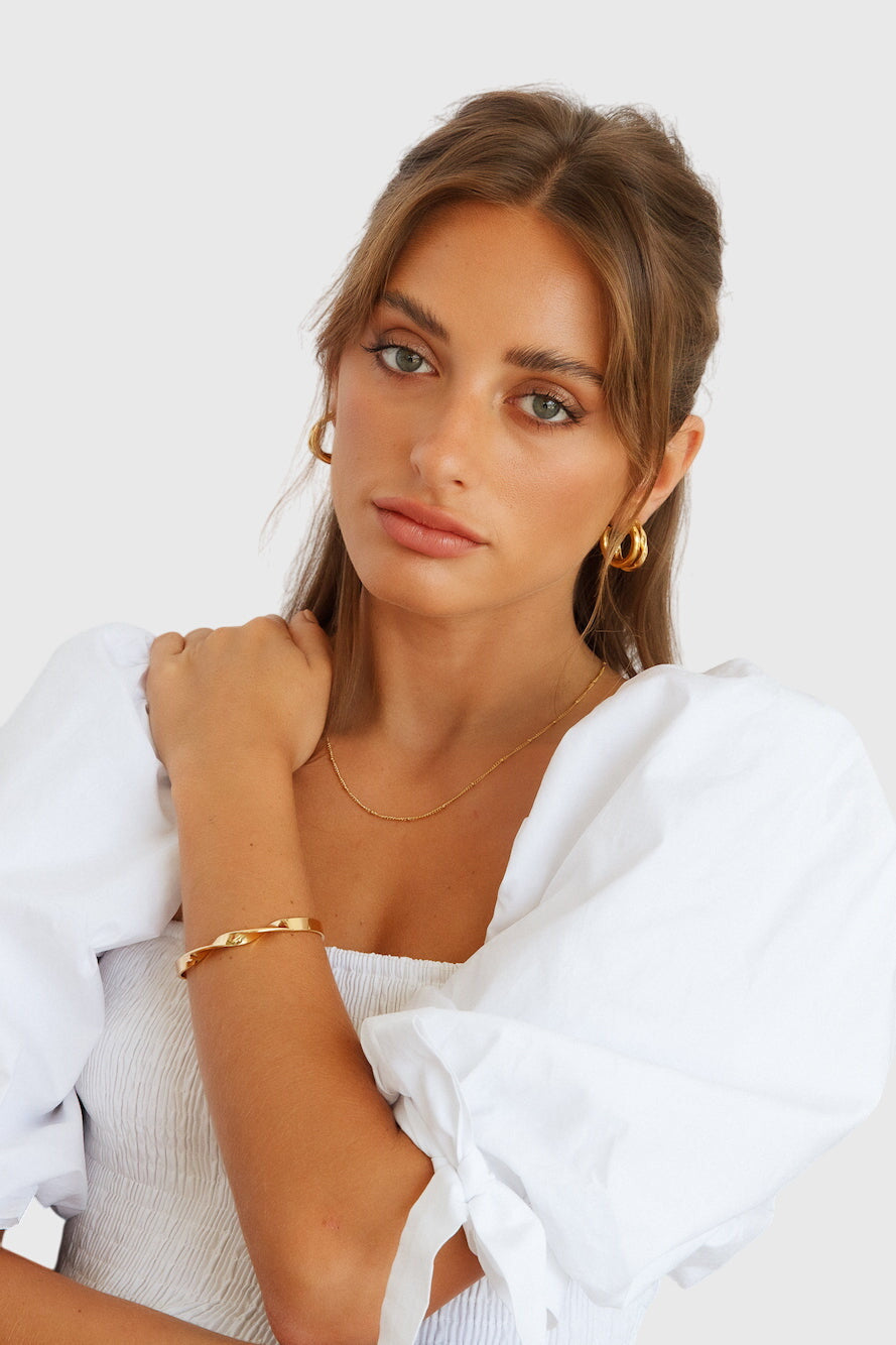 Bracelet à finition dorée