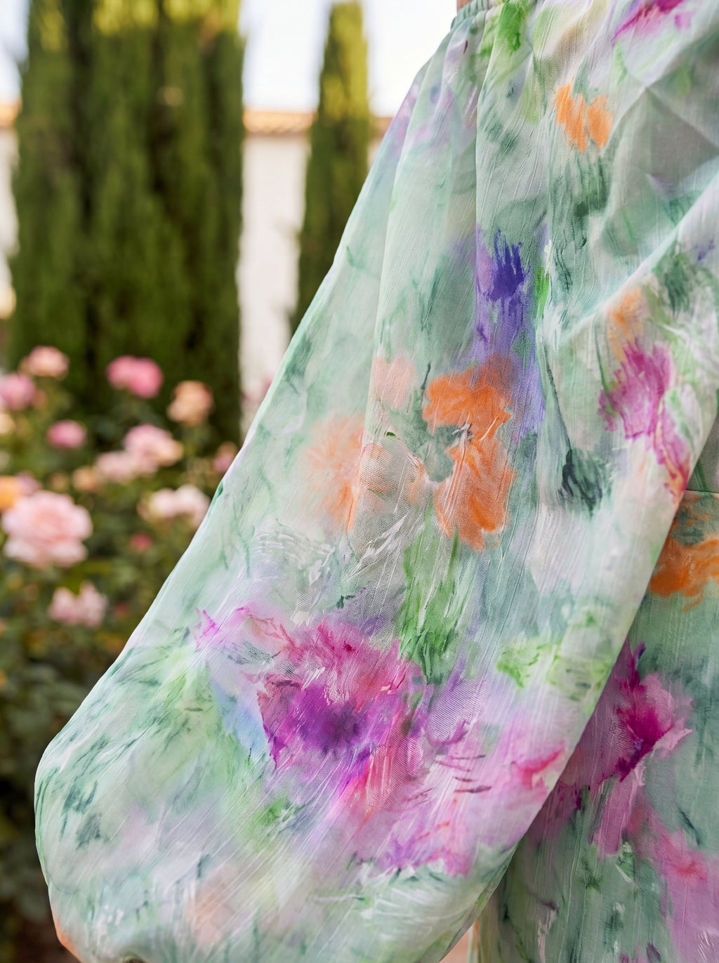 Robe longue à taille marquée et jupe ample