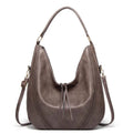 Sac porté épaule à la ligne sobre