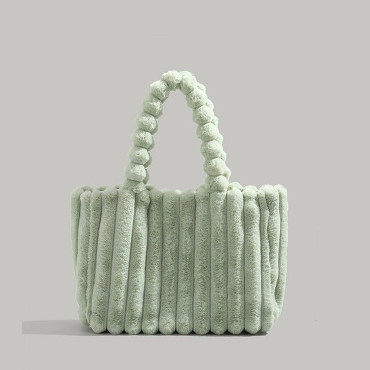 Sac à la ligne arrondie