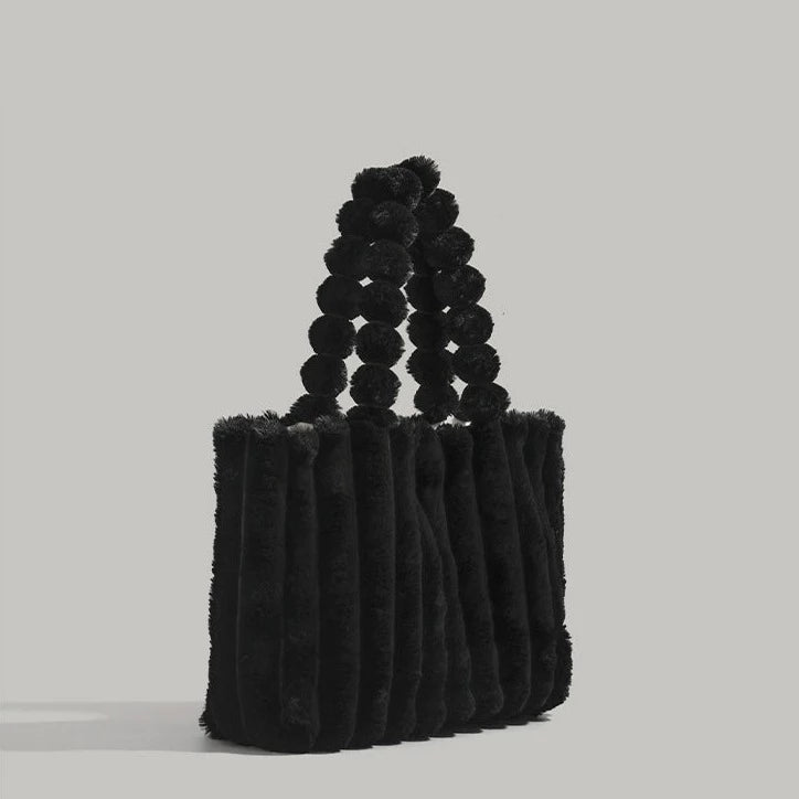 Sac à la ligne arrondie