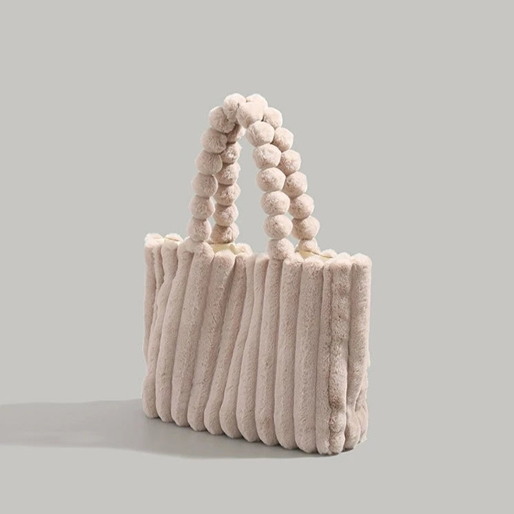 Sac à la ligne arrondie