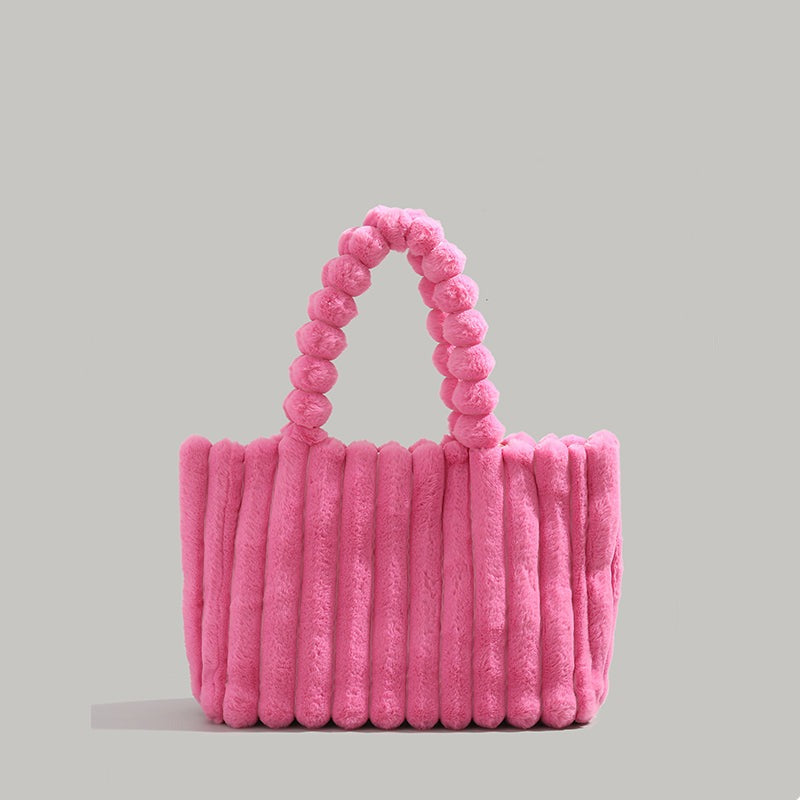 Sac à la ligne arrondie