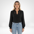 Blouse en dentelle à poignets froncés