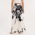 Pantalon palazzo à imprimé botanique