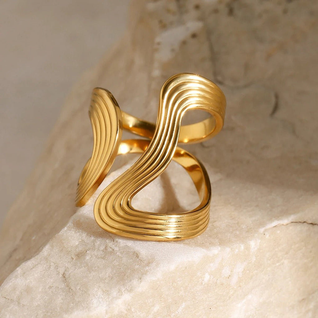 Boucles d’oreilles à la forme ondulée