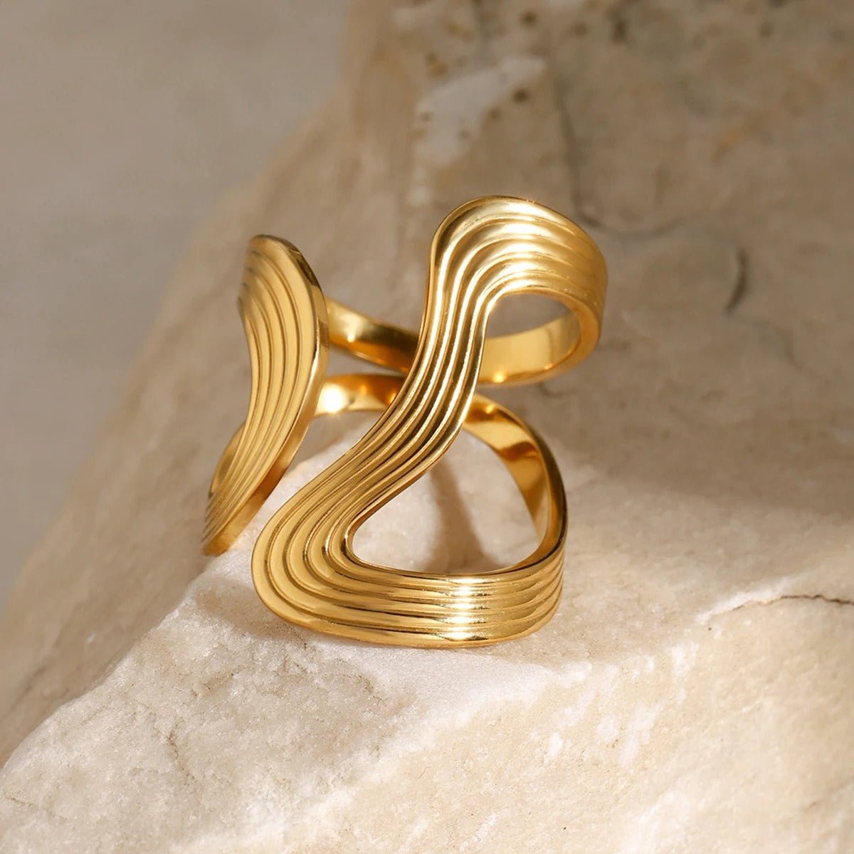 Boucles d’oreilles à la forme ondulée