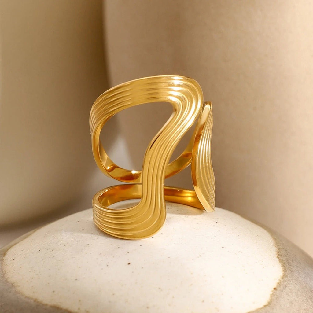 Boucles d’oreilles à la forme ondulée