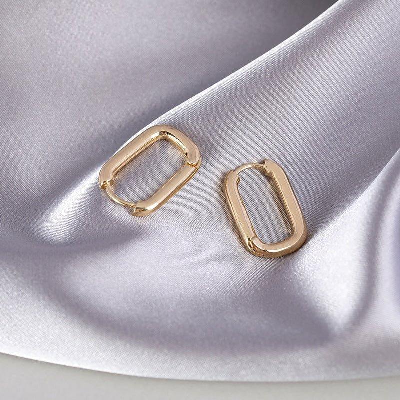 Boucles d’oreilles à la ligne fine