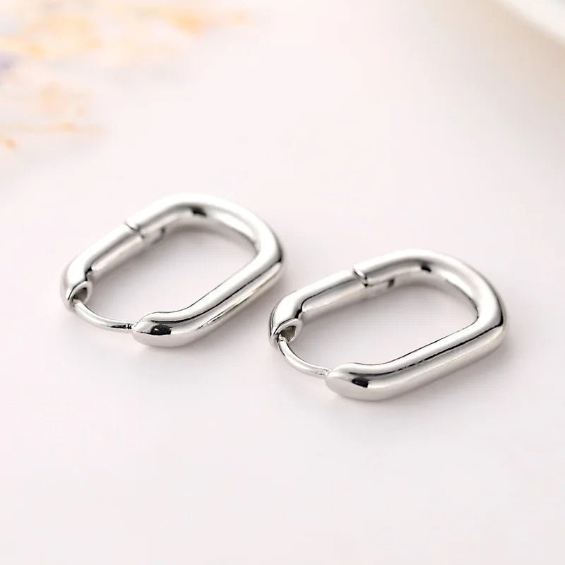 Boucles d’oreilles à la ligne fine