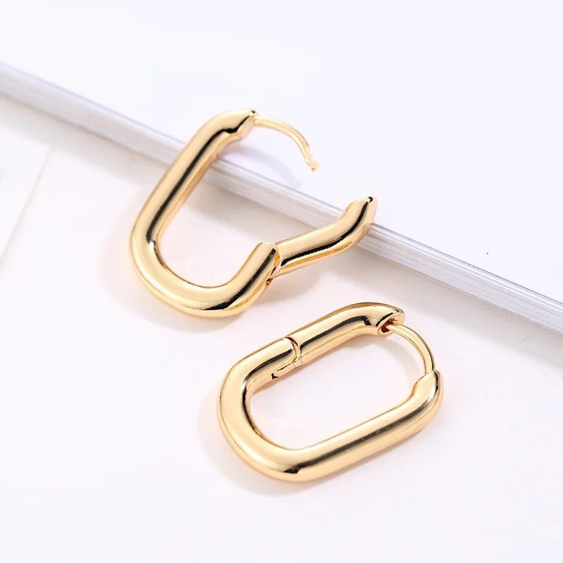 Boucles d’oreilles à la ligne fine