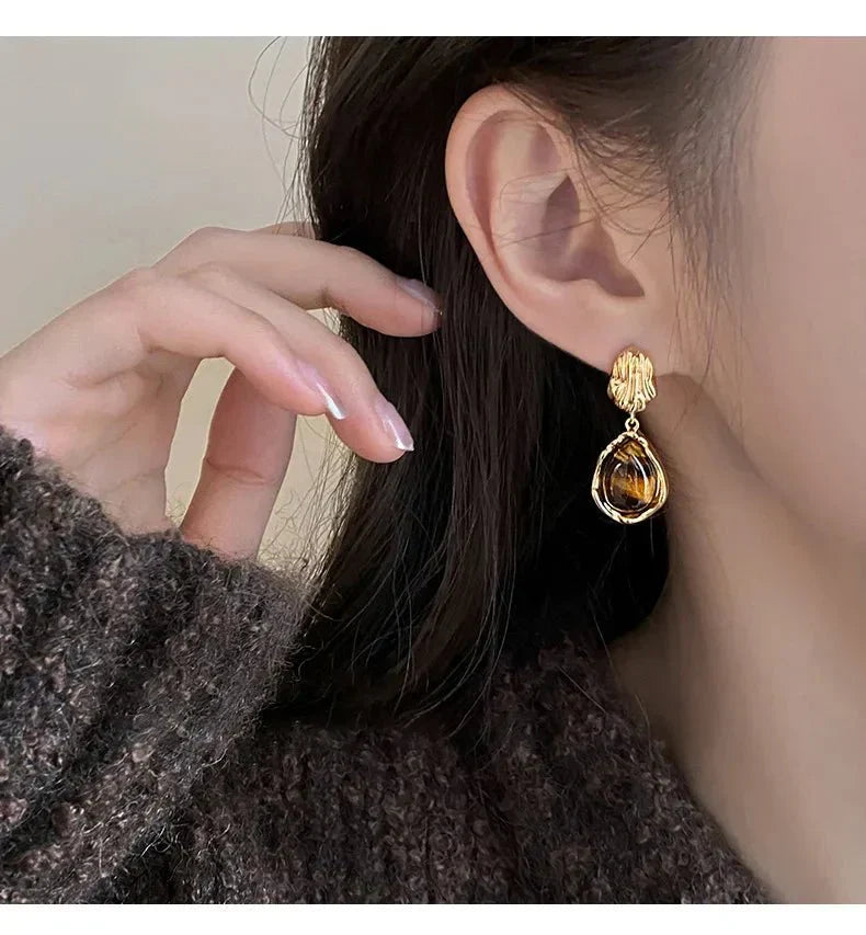 Boucles d’oreilles bouton ou goutte