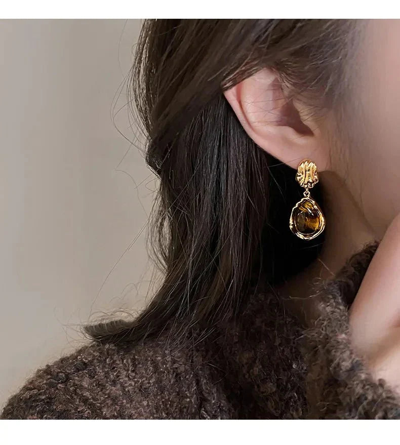 Boucles d’oreilles bouton ou goutte